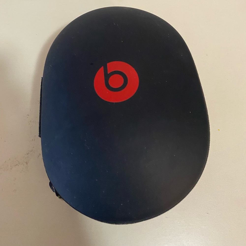 Beats by Dre Studio Headphones.  Used. There is wear on the headphones foam.